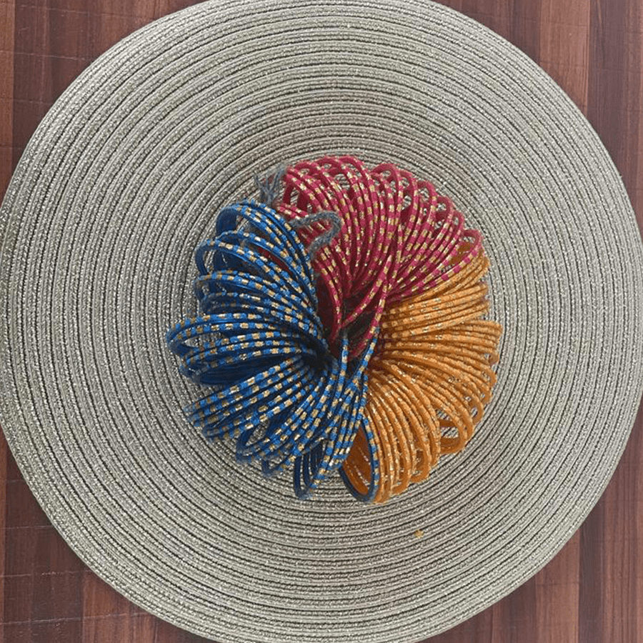 Handcrafted glass bangles in yellow, red and blue color
