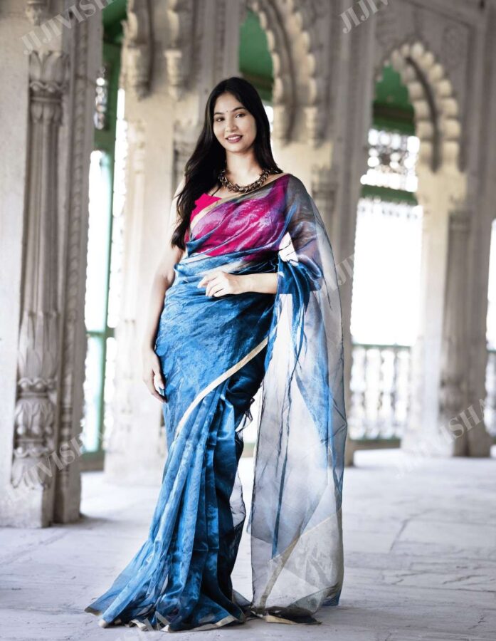Teal Blue Tissue Silk Saree with Shimmering Golden Edge